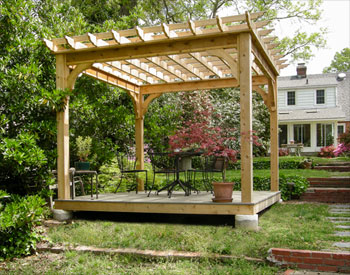 10 X 10 Cedar Deluxe 4 Beam Pergola shown with Stainless Steel Hardware, 16" Top Runner Spacing, Standard Braces, Standard Posts,  and Gray Composite Deck.