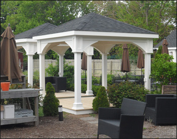  Two 10 x 10 Vinyl Ramada shown with Standard White Vinyl, Treated Pine Deck, 6" High Post Trim, 6" x 6" Posts, Standard Post Height, No Cupola, Dual Black Asphalt Shingles.