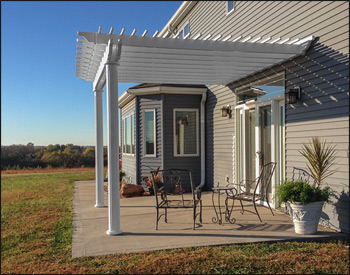 10 x 12 Vinyl Vintage Classic Wall Mount Pergola shown with stainless steel hardware, 6" top runner spacing, 6" round fluted columns, and no deck. 