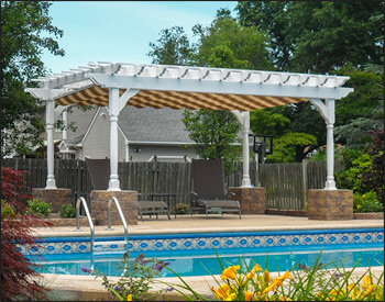 10 x 14 Vinyl Vintage Classic Pergola shown with stainless steel hardware,16" top runner spacing, decorative posts, no deck, and multi-rail canopy in Westfield Mushroom.