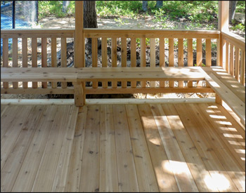 12 x 12 Cedar Rectangular Gazebo shown with red cedar deck, 1x3 standard railings, straight posts, straight fascia, cedar shake shingles, unstained, stainless steel hardware, additional entrance, 8 bench sections and cupola. 