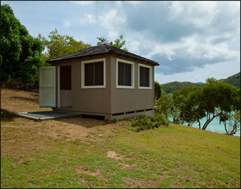 12 x 12 Red Cedar Square Cabana Shown with Cedar Shingles, Custom Finished Interior, FOUR 40 x 46 Sliding Windows, Customers Fan, Stain,  Gutters and Deck.