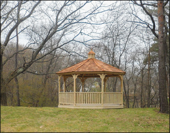 14 Economy Treated Pine Octagon Gazebo shown with  Cupola, No Top Rails, Treated Pine Deck, Cedar Shake Shingles, and Straight Fascia. 