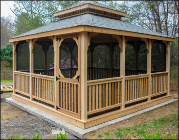 14 x 14 Cedar Rectangular Double Roof Gazebo shown with 1x3 Rails, Straight Fascia, Cedar Deck, Cedar Tongue & Groove Ceiling, Full Set of Screens & Screened Door, Cupola, Old English Pewter Asphalt Shingles, Screened Floor, and Hidden Wiring w/ 1 Receptacle & Switch