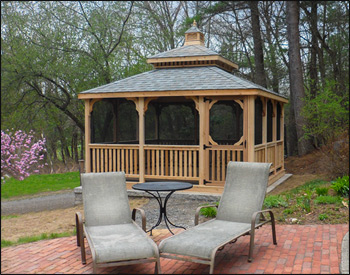 14 x 14 Cedar Rectangular Double Roof Gazebo shown with 1x3 Rails, Straight Fascia, Cedar Deck, Cedar Tongue & Groove Ceiling, Full Set of Screens & Screened Door, Cupola, Old English Pewter Asphalt Shingles, Screened Floor, and Hidden Wiring w/ 1 Receptacle & Switch