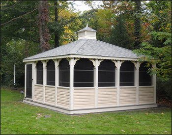  16 x 16 Vinyl Rectangular Gazebo shown with Almond Vinyl, Gray Composite Deck, Custom Solid bottom Rails, Standard braces, No Top Railing, Vinyl Finished Ceiling, 4 Track Window System with screens, Old English Pewter Asphalt Shingles, Offset Door, Hidden Wiring w/ 1 Receptacle & Switch.