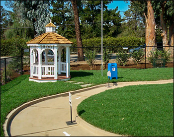 6 Vinyl Octagon Gazebo shown with Treated Pine Deck, Cupola, Wavy Fascia, and Cedar Shake Shingles. 