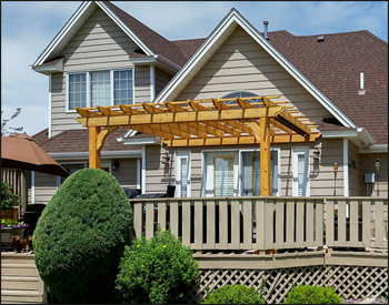 9 x 10-9" Cedar Vintage classic wall mount pergola shown with Clear Stain Sealer, No Deck, Galvanized Hardware, and 16" Top Runner Spacing.