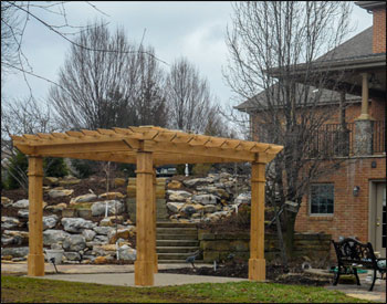 10 x 10 Red Cedar Solace Free Standing Pergola shown with Custom Semi-Transparent Stain/Sealer , 16" Top Runner Spacing, and Custom Trim