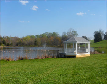 12 x 20 Vinyl Elongated Hexagon Belle Gazebo shown with Old English Pewter Asphalt Shingles, Electrical Package, and Custom 36"  Vinyl Railings.